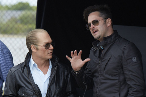 (L-r) JOHNNY DEPP as Whitey Bulger and director SCOTT COOPER on the set of the as-yet-untitled Whitey Bulger film, which has begun filming on location in Boston. Photo credit: Claire Folger