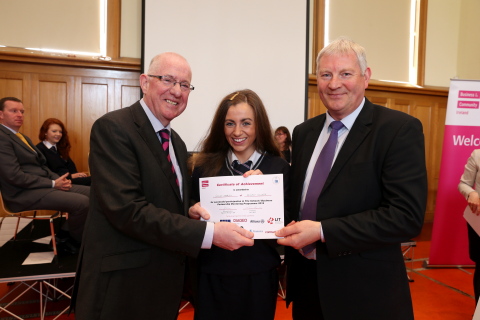 Minister for Children and Youth Affairs, Charles Flanagan T.D. (left) and John Everett, senior programmer, Pramerica (right) join BITCI participant Gillian Marley as she accepts her completion certificate.(Photo: Business Wire)