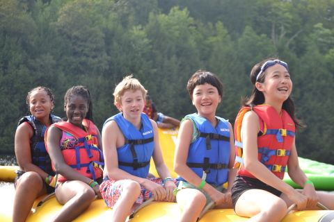 Kids have an opportunity to learn, grow and thrive at New York City's YMCA summer day and sleepaway camps. (Photo: Business Wire)