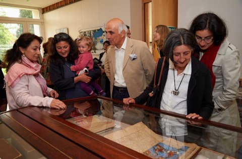 Guests admire the Shahnama exhibits at the new Shahnama Centre for Persian Studies at Pembroke College. Image courtesy of the Shahnama Centre. Photograph © Nigel Luchhurst