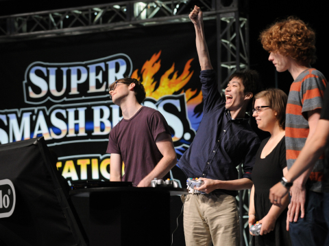 In this photo provided by Nintendo of America, Masaya “Amsa” Chikamoto of Japan celebrates a victory in a multiplayer battle at NOKIA Theatre L.A. LIVE in Los Angeles on June 10, 2014, to celebrate the upcoming launches of Nintendo’s Super Smash Bros. video games for Nintendo 3DS and Wii U. Thousands of fans in the audience and countless more watching online witnessed new Super Smash Bros. characters clashing with existing favorites in action for the first time. (Photo: Business Wire)