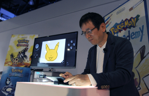 In this photo provided by Nintendo of America, Tsunekazu Ishihara, president and CEO of The Pokémon Company, divulges highly-anticipated details about the new games, Pokémon Art Academy, Pokémon Omega Ruby and Pokémon Alpha Sapphire, launching later this year exclusively for the Nintendo 3DS system. For the first time ever, Nintendo is showing the world how E3 looks through a child's eye by welcoming a select group of kids to the Nintendo Kids Corner event at the Nintendo booth at E3.