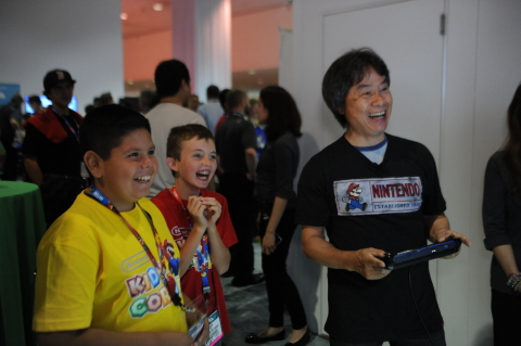 In this photo provided by Nintendo of America, Alex, 9, Robbie, 10, have fun playing Mario Maker (working title) for the first time with Shigeru Miyamoto, the creator of Super Mario Bros. and The Legend of Zelda on June 11 at the Nintendo Kids Corner event at the E3 Nintendo booth. For the first time ever, Nintendo gave the world a glimpse of the thrill of E3 through the eyes of a child by welcoming a select group of kids to the Nintendo Kids Corner event at the Nintendo booth. They enjoyed an exclusive, insider's look at the latest games announced for the Wii U console and the Nintendo 3DS system.