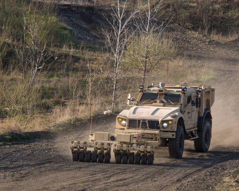 The Oshkosh® M-ATV equipped with TerraMax UGV and a mine roller (pictured) is capable of autonomous navigation for route clearance missions. (Photo: Business Wire)