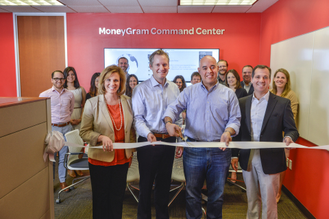 (left to right) Christina Martin, VP Digital Marketing; Alex Holmes, Chief Operating Officer & Chief Financial Officer; Juan Agualimpia, Chief Marketing Officer; and Pete Ohser, EVP, U.S. & Canada join the MoneyGram Digital Team for the grand opening of the MoneyGram Digital Command Center. (Photo: Business Wire)