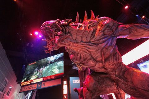 Evolve captivated attendees at the 2014 E3 Show in Los Angeles. Here a 30-foot monster stands in 2K's booth where attendees lined-up for hours each day to play the upcoming game. (Photo: Business Wire)