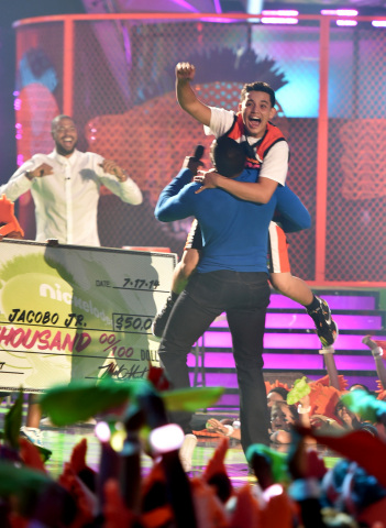 Photo credit: Nickelodeon Los Angeles local Ricardo Jacobo Jr. makes remarkable half-court shot, stuns the crowd, and wins this 15-year-old $50,000! (Photo: Business Wire)