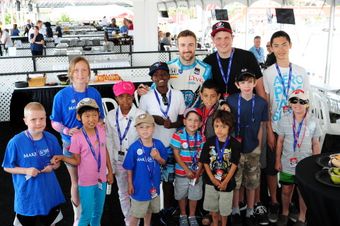 Canadian Verizon IndyCar driver, James Hinchcliffe, visits Make-A-Wish Canada children at the Honda Indy Toronto. Thanks to the generosity of Toronto race fans, support from the Ontario Honda Dealers Association and Honda Canada Inc., more than $62,000 was raised for Make-A-Wish Canada during a race weekend filled with fun both on and off the track. (Photo: Business Wire)