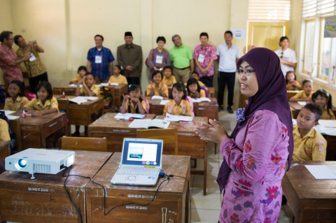 Children engaged in learning with multimedia devices for the first time. (Photo: Business Wire)