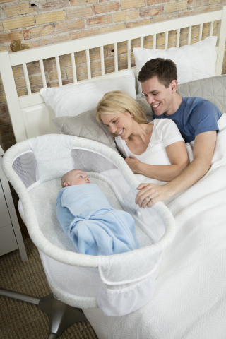 The elliptical swivel of the Bassinest allows baby to get closer to mom and dad.(Photo: Business Wire)