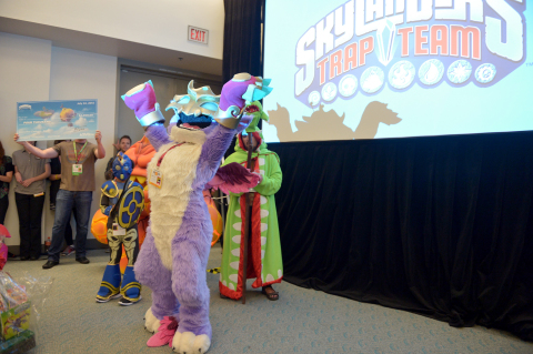 In this photo distributed by Activision Publishing Inc., Skylanders fans celebrate the upcoming launch of Skylanders Trap Team by participating in a costume contest at San Diego Comic-Con 2014 on July 24, 2014 in San Diego, California. Shannon Deeds beat out other contestants for the ultimate prize and bragging rights of being the best costumed character, Scratch. (Photo by Charley Gallay/Getty Images for Activision)