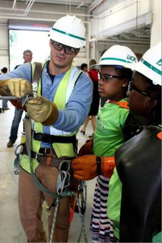 BGE utility employees spend one-on-one time with scholars from the Higher Achievement, Baltimore Summer Academy, enhancing their science, technology, engineering and mathematics (STEM) skills by tackling hands-on electric and natural gas learning exercises. (Photo: Business Wire)