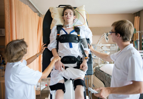 Patient with therapists during the therapy with the ErigoPro. Picture courtesy of the CHUV, Lausanne, Switzerland (Photo: Business Wire)