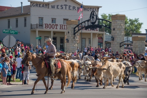 Over 25,000 people gathered in Dodge City today to witness the largest longhorn cattle drive down a main street since the 1800s sponsored by Boot Hill Casino and Resort in partnership with the Wild West Heritage Foundation. (Photo: Business Wire)