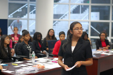 Odalys Garcia (front), a rising freshman in NJ LEEP's College Bound Program, conducts a direct examination of her witness during the Championship Round at NJ LEEP's Mock Trial Competition at Seton Hall Law School. (Photo: Business Wire)