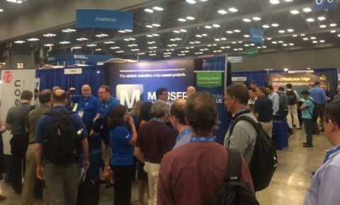 Attendees at the NIWeek design conference in Austin crowd around the exhibit of Mouser Electronics to learn more about the upcoming release of Mouser's MultiSIM BLUE, a free circuit design tool for engineers. The global distributor is collaborating with National Instruments on the powerful new tool. (Photo: Business Wire)