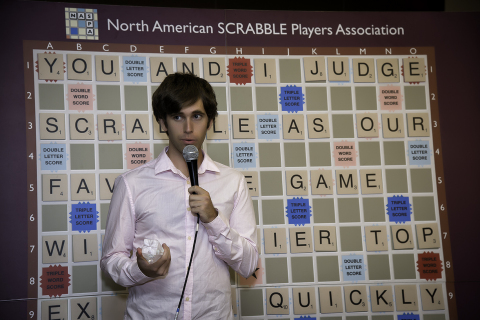 Conrad Bassett-Bouchard of Portland, OR celebrates winning the 2014 National SCRABBLE Championship at the Buffalo Niagara Convention Center, Wednesday August 13. Bassett-Bouchard defeated several top SCRABBLE players during the tournament to win the champion title and a $10,000 prize. (Photo: Business Wire)