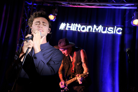 Mikky Ekko performs his brand new single, "Smile," during an intimate concert at Hilton Times Square on August 14, 2014 in New York City. As part of its "Our Stage. Your Story." campaign, Hilton Hotels & Resorts teamed up with SPIN to set the stage for exclusive concerts this summer to inspire memorable travel stories. (Photo by Stephen Lovekin/Getty Images for Hilton Hotels & Resorts)