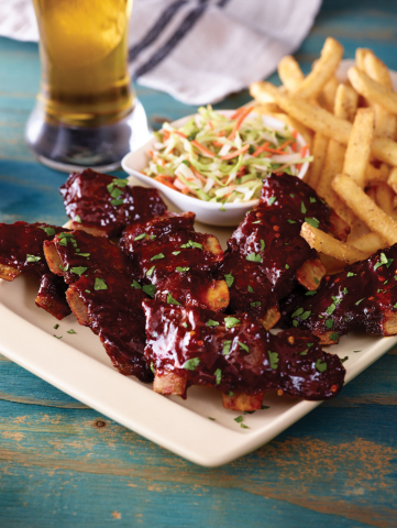 Applebee's new Crosscut Ribs feature the most tender, meaty bone-in cuts of pork loin, tossed in new handcrafted sauces. (Photo: Business Wire)