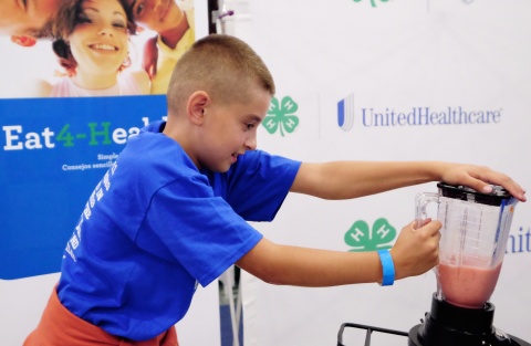 Aidan Feely, from Central City Elementary School in Central City, creates his own healthy smoothie on the UnitedHealthcare and 4-H healthy-smoothie bike at the Nebraska State Fair on Thursday, Aug. 28, in Grand Island, Neb. The healthy smoothie bikes are part of 4-H and UnitedHealthcare's "Eat4-Health" partnership aimed at tackling obesity by promoting healthy eating and lifestyles among children and families (Photo: Chad Greene).