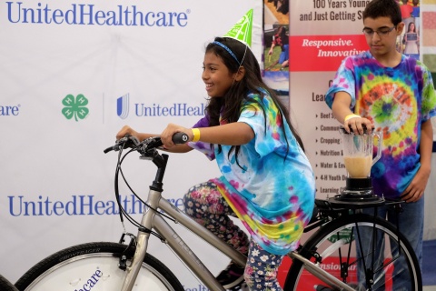 Heydy Benitez, left, and Noah Beedles, 5th graders from Platte Valley Elementary School in Grand Island, create their own healthy smoothies on the UnitedHealthcare and 4-H smoothie bike at the Nebraska State Fair on Thursday, Aug. 28, Grand Island, Neb. The healthy smoothie bikes are part of 4-H and UnitedHealthcare's "Eat4-Health" partnership aimed at tackling obesity by promoting healthy eating and lifestyles among children and families (Photo: Chad Greene).