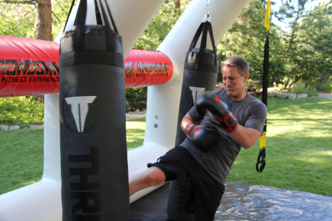 Throwdown's mobile contained airframe structure is versatile and can hold over 1,000 pounds of heavy bags while accommodating resistance bands, suspension straps, battling ropes and any other functional fitness training gear. (Photo: Business Wire)