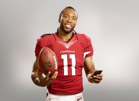 Eight-time Pro Bowler Arizona Cardinals wide receiver Larry Fitzgerald shows how easy it is to pay on his mobile phone using Visa Checkout. (Photo: Business Wire)

