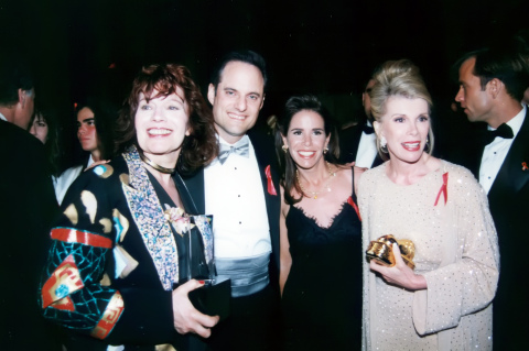 Joan Rivers Honored at AIDS Healthcare Foundation’s Academy Awards Gala in 1992. L to R: AIDS advocates including PAWS/LA co-founder Nadia Sutton, AIDS Healthcare Foundation President Michael Weinstein, Melissa Rivers, and her mother, comedienne Joan Rivers, at an AHF Oscar Night Gala benefiting AHF held at the Director’s Guild of America in Los Angeles in 1992. Rivers’ longtime hairdresser had been a patient at AHF’s Chris Brownlie AIDS Hospice in 1989, which led Rivers to become an ardent supporter of AHF and early advocate on AIDS issues. (Photo: Business Wire)