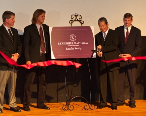 Berkshire Hathaway HomeServices Results Realty co-owners (from left) Tim St. Gordon, Jeff Perry and Joseph Doher look on as Earl Lee, CEO of HSF Affiliates LLC, cuts a ribbon commemorating the brokerage's brand transition. (Photo: Business Wire)