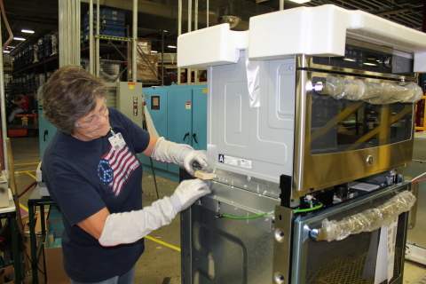 Jan Prince preps a new built-in Advantium/wall oven combo for shipment at the Roper plant in LaFayette, Ga. Advantium is GE’s speedcooking oven that makes home-cooked meals in a fraction of the time. (Photo: GE)