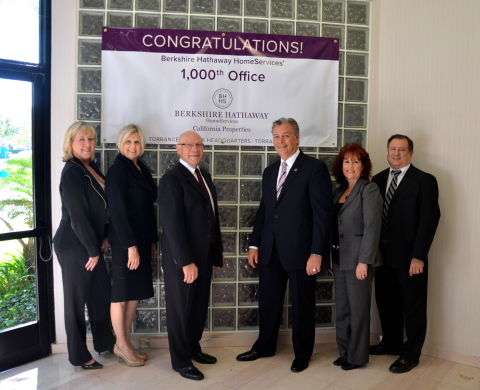 Berkshire Hathaway HomeServices today named its 1,000th office, a milestone reached in exactly one year from the brokerage network's launch. The distinction belongs to Torrance, CA-based Berkshire Hathaway HomeServices California Properties and its Torrance/Skypark headquarters. Berkshire Hathaway HomeServices Senior Vice President Lou Gonzalez (third from right) joins the brokerage's leadership team of (from left) Mistydawn Jones, Jerrie Short, Bruce Short, Denise Scarpetti and Rick Elorriaga in commemorating the distinction. (Photo: Business Wire)