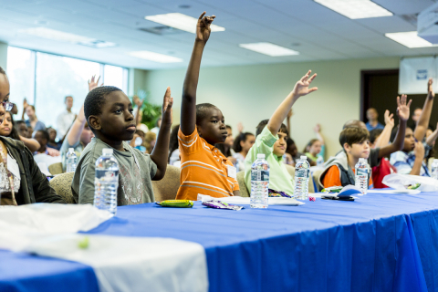 Fifth-grade students from Woodland Acres Elementary School, Jacksonville, Fla., attend an interactive field trip at the corporate headquarters of The Main Street America Group. 
(Photo: Business Wire)