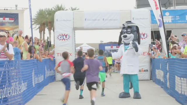 Young athletes are crossing the finish line with UnitedHealthcare mascot Dr. Health E. Hound at the 2013 UnitedHealthcare IRONKIDS Las Vegas Fun Run (Video: Gabriel Lapuz).