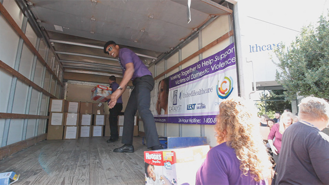 UnitedHealthcare's Chico office employees help load boxes of food and everyday items onto a truck to be delivered to Catalyst Domestic Violence Services' emergency shelter on Wednesday, Oct. 1. UnitedHealthcare employees and Chico Chamber of Commerce helped highlight October's Domestic Violence Awareness month by delivering more than 4,000 pounds of food and dozens of boxes of everyday necessities such as toothbrushes, soap and blankets for Catalyst's emergency shelter (Video: Brian Peterson).