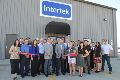 Intertek personnel from the new North Dakota facility and USA management join together to cut the ribbon and open this new, large, petroleum laboratory dedicated to the region's Oil & Gas industry. (Photo: Business Wire)