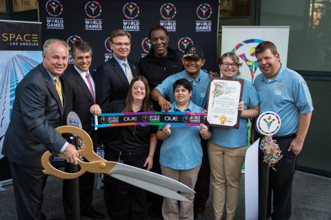 Special Olympics World Games 2015 celebrates the opening of their new headquarters with OUE Limited. From left to right: Council Member Tom LaBonge, OUE Limited President and CEO Richard Stockton, President and CEO of LA2015 Patrick McClenahan, Olympic Champion and Special Olympics Southern California Founder Rafer Johnson and World Games Global Messengers. (Photo credit: Jason Tully)