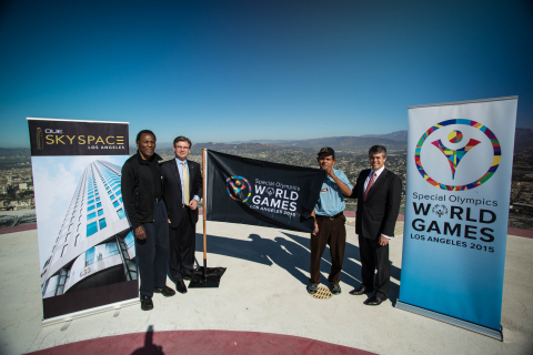 Special Olympics World Games 2015 Celebrates the opening of their new headquarters with OUE Limited on the helipad of the US Bank Tower. From left to right: Olympic Champion and Special Olympics Southern California Founder Rafer Johnson, President and CEO of LA2015 Patrick McClenahan, World Games Global Messenger Marco Martinez and OUE Limited President and CEO Richard Stockton. (Photo credit: Jason Tully)