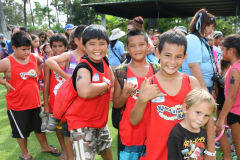 Local youth from Kama'aina Kids show off their game faces as they prepare to compete in the UnitedHealthcare IRONKIDS Keiki Dip-n-Dash. From L to R: William Huihui-Wilton, Daniel Alcos-Penovaroff, Keanu Cerezo and Nathanael Perez of the Big Island. Photo Source: Kirk Lee Aeder