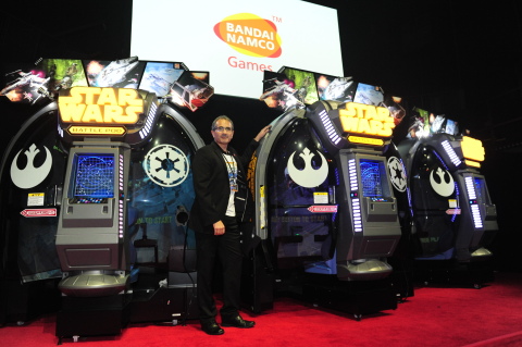 President and CEO BANDAI NAMCO Amusement America Inc., John McKenzie, unveils Star Wars™ Battle Pod™ arcade game, Wednesday, Oct 8th, 2014, in New York, NY (Photo: Business Wire)