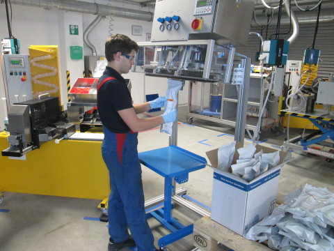 AEROSPACE SEALANTS - Value-Added Packaging Operator Viktor Merklinger fills a SEMKIT(R) package with high-performance, lightweight aerospace sealant on new equipment at PPG Industries' (NYSE:PPG) Central Europe application support center in Hamburg, Germany. SEMKIT packages are an industry standard for pre-proportioned, two-part aerospace sealants, and they are among the many configurations available with SEMCO(R) packaging and application systems. In addition to SEMKIT packaging, the Hamburg facility's new capabilities include providing premixed and frozen sealant and Customized Sealant Solutions products such as PRC(R) seal caps and PRC SEMFOAM(TM) sealant. (PRC, SEMCO and SEMKIT are registered trademarks and SEMFOAM is a trademark of PRC-DeSoto International, Inc.)(Photo:Business Wire)