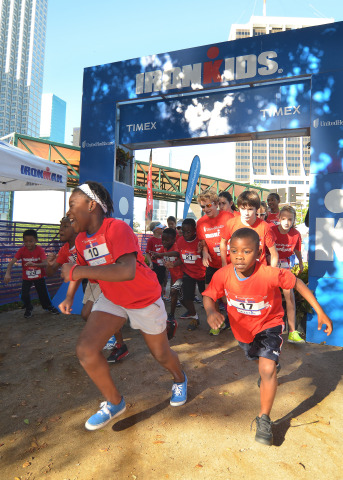 Local youth take off for the finish line at this morning's UnitedHealthcare IRONKIDS Miami Fun Run at Bayfront Park. Photo Credit: Gaston De Cardenas