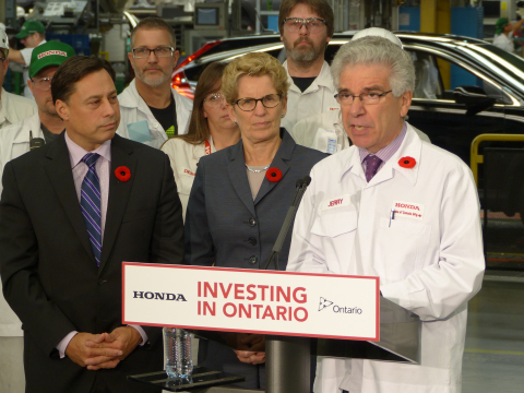 Honda of Canada Mfg. (HCM), a division of Honda Canada Inc., announced that it will invest $857 million over three years to innovate its three award-winning manufacturing plants in Alliston, ON with new technologies and processes.  Left to right, Ontario Minister of Economic Development, Employment and Infrastructure, Brad Duguid; Premier of Ontario, Kathleen Wynne; and President and CEO of Honda Canada Inc., Jerry Chenkin. (Photo: Business Wire)