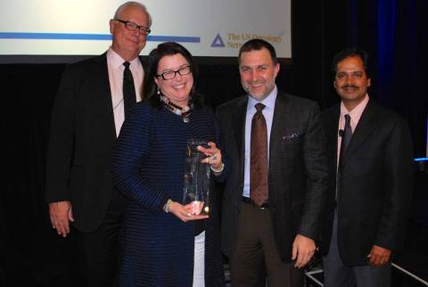 The US Oncology Network presents the LEAD award to Bristol-Myers Squibb for Leadership in Education And Clinical Development. Left to right: Dr. Barry Brooks, Texas Oncology; Teresa Bitetti, BMS; Nick Loporcaro, The US Oncology Network; Dr. Vivek Kavadi, Texas Oncology, an affiliate of The US Oncology Network. (Photo: Business Wire)