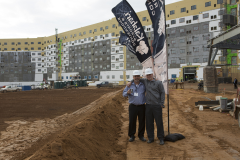 Kalahari Resorts and Conventions' owner Todd Nelson and son Travis pose outside their newest property set to open in the Pocono Mountains, Pennsylvania. The family owned resort is on schedule for a June 2015 opening. For more information or to make reservations visit www.KalahariResorts.com/Pennsylvania. (Photo: Business Wire)