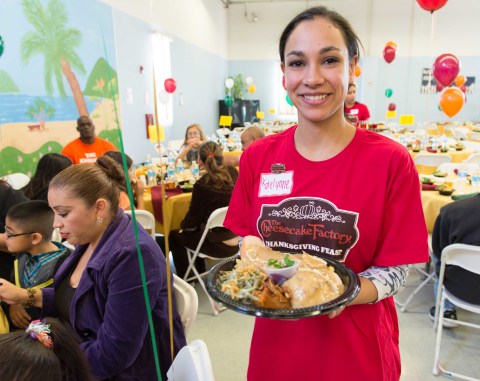 Staff Volunteer at The Cheesecake Factory's 2013 Thanksgiving Day Feast (Photo: Business Wire)