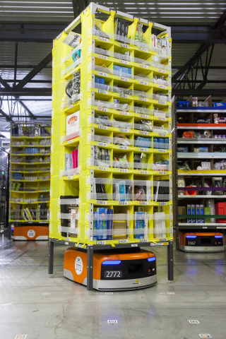 A Kiva robot moves product in Amazon's eighth generation fulfillment center. (Photo: Business Wire)