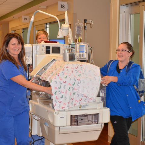 Nurses at Saint Joseph Hospital move a NICU patient from the old hospital to the new on 12-13-14. (Photo: Business Wire)