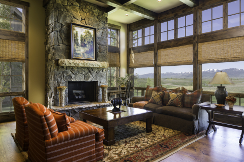Living room of Huntsman Springs Mountain Lodge home overlooking the Grand Tetons and golf course. (Photo: Business Wire)