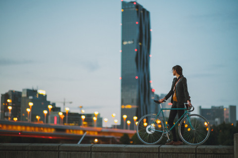 The FlyKly Smart Wheel replaces the rear wheel on an ordinary bike to transform it into a 21st century smart bike that offers the benefits of both electric and human-powered cycling. (Photo: Business Wire)