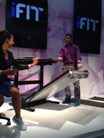 The large desk surface quickly swings out of the way easily, while still keeping your laptop and projects in place so that you can set up the treadmill. See it at booth #74321 at the Sands Expo Center. (Photo: Business Wire)